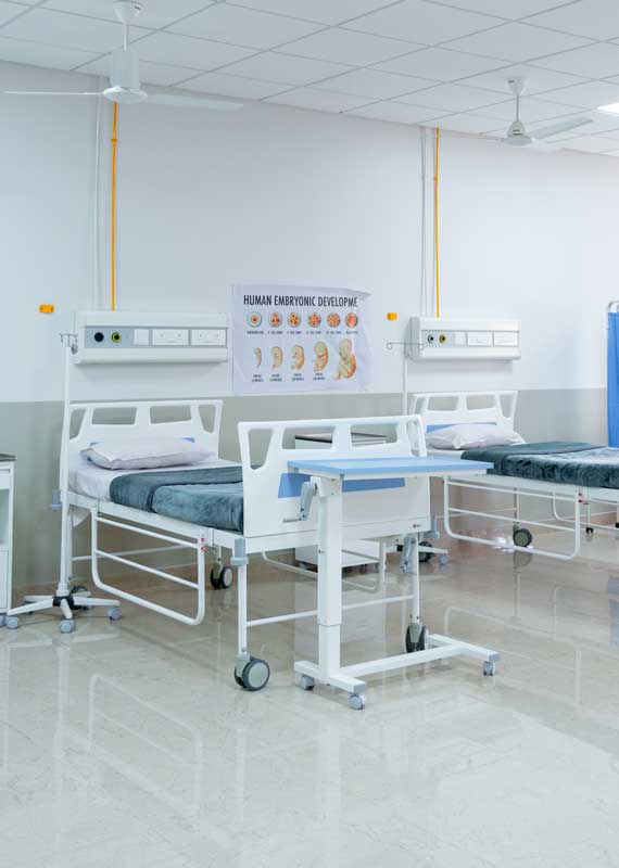 hospital bed with chart hanging